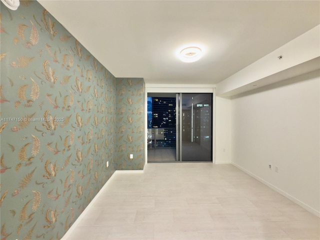 1000 Brickell Plz Unit 4314, Miami, FL 33131 - empty room featuring baseboards