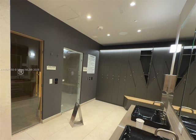 1000 Brickell Plz Unit 4314, Miami, FL 33131 - bathroom featuring tile patterned flooring, baseboards, and recessed lighting
