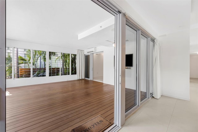 interior space featuring a wall mounted AC