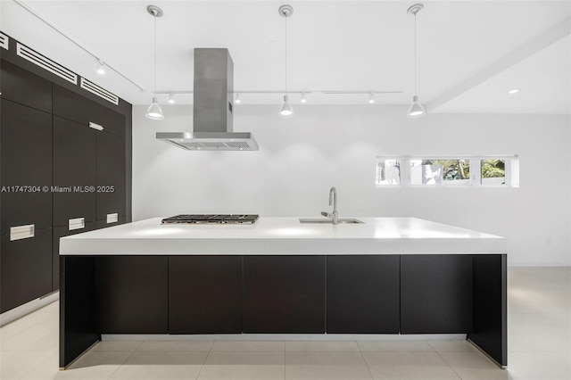 kitchen featuring pendant lighting, a large island, light countertops, island range hood, and modern cabinets