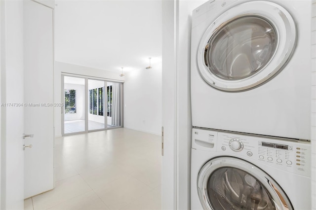 laundry area with laundry area and stacked washing maching and dryer