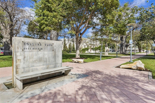 view of home's community featuring a lawn