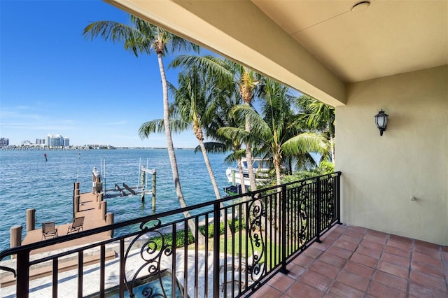 balcony with a view of city and a water view