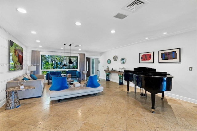 living room with baseboards, visible vents, and recessed lighting