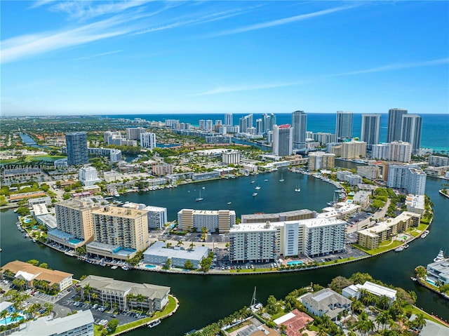 bird's eye view featuring a water view and a view of city