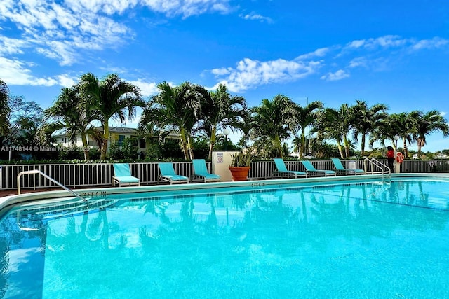 community pool with fence
