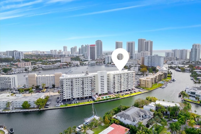 aerial view with a water view and a view of city