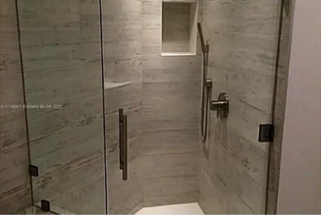 bathroom featuring a stall shower