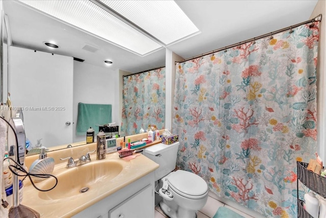 full bath with vanity and toilet