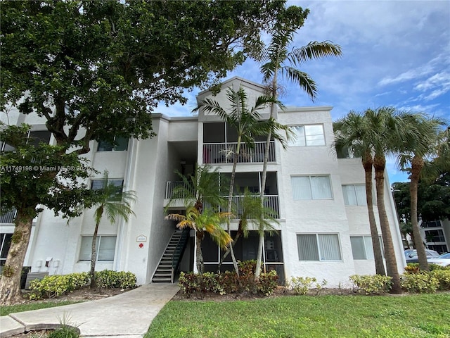 view of building exterior with stairway