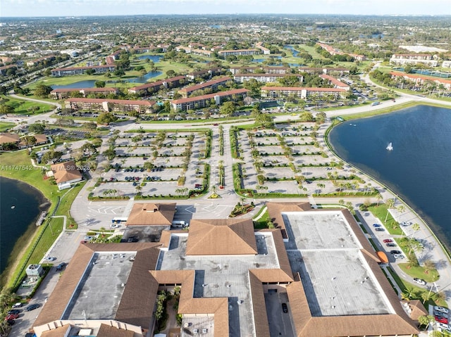 aerial view featuring a water view and a residential view