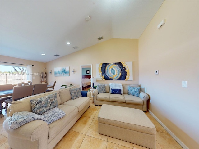 living room with lofted ceiling, light tile patterned floors, baseboards, and visible vents