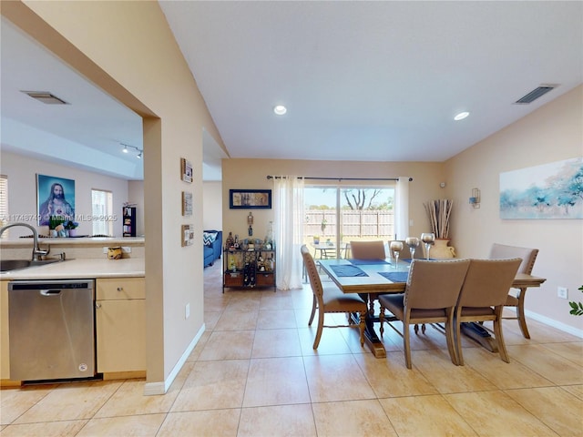 dining area with light tile patterned floors, baseboards, visible vents, and recessed lighting