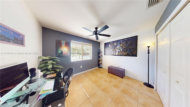 office area featuring ceiling fan, light tile patterned floors, and visible vents