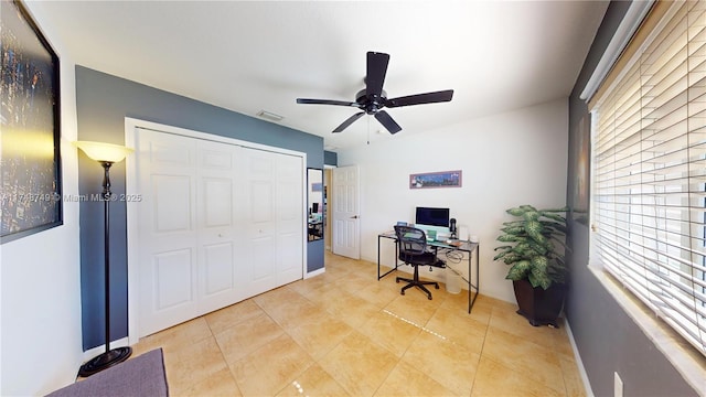 office area featuring visible vents, ceiling fan, and light tile patterned floors