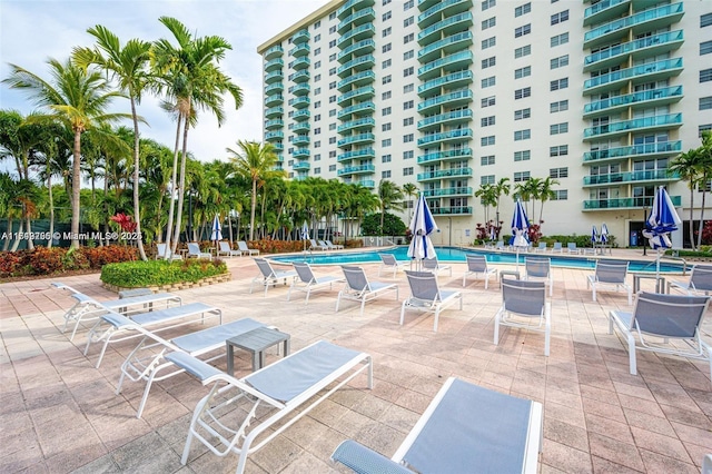 community pool with a patio