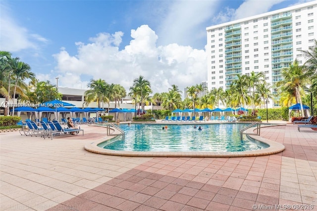 pool with a patio area