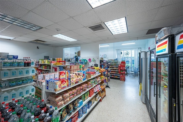 misc room with visible vents and a drop ceiling