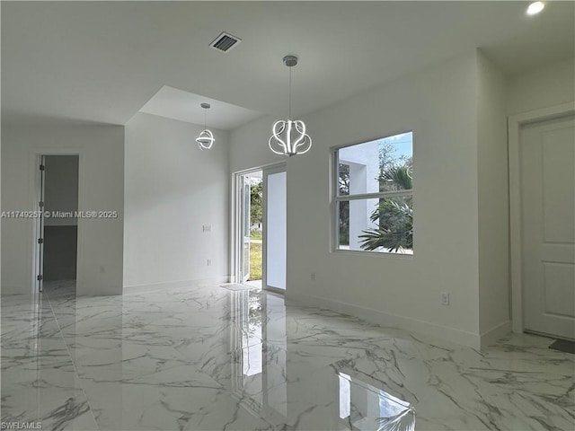 unfurnished room featuring marble finish floor, visible vents, and baseboards