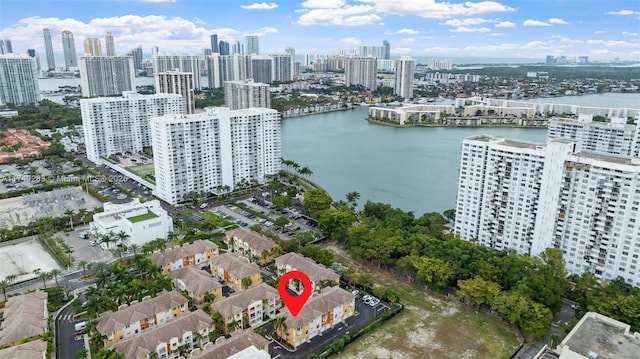 aerial view of a skyline view and a nearby body of water
