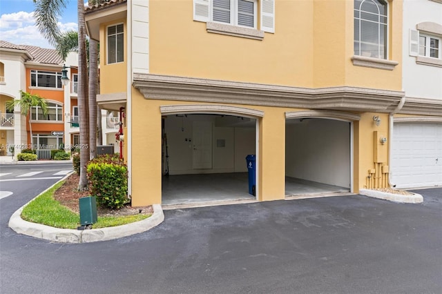 18408 NE 27th Ct Unit 18408, Aventura, FL 33160 - view of front of house with stucco siding and an attached garage