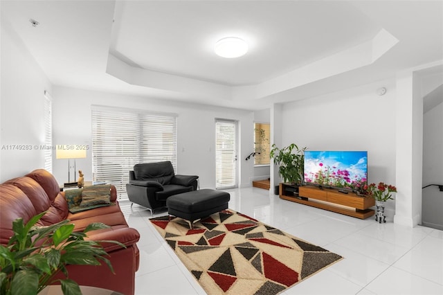 18408 NE 27th Ct Unit 18408, Aventura, FL 33160 - living room with a tray ceiling and light tile patterned floors