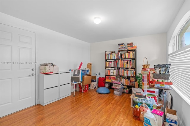 game room with wood finished floors