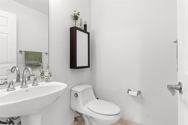 18408 NE 27th Ct Unit 18408, Aventura, FL 33160 - half bath featuring a sink and tile patterned floors