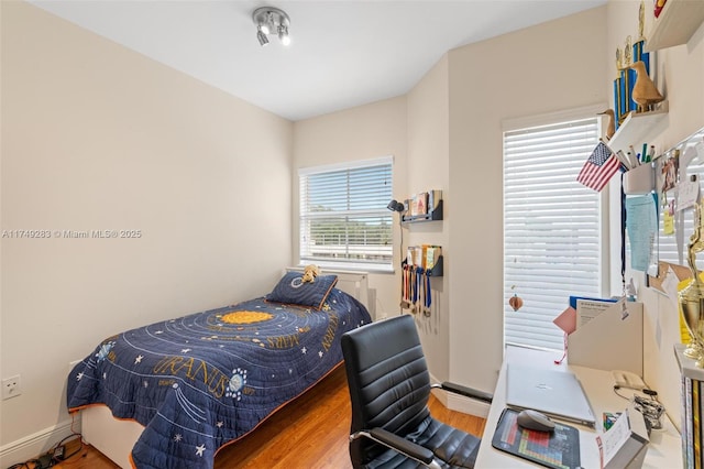 18408 NE 27th Ct Unit 18408, Aventura, FL 33160 - bedroom featuring wood finished floors and an office area