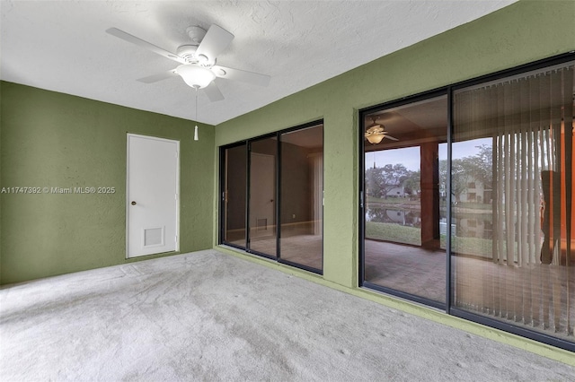 interior space featuring ceiling fan