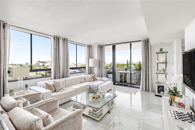 living room featuring marble finish floor