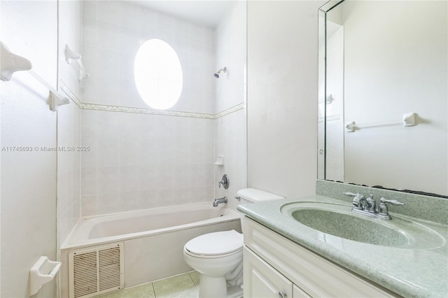 full bath featuring visible vents, toilet, tile patterned floors, vanity, and washtub / shower combination