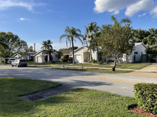 view of road featuring sidewalks and a residential view