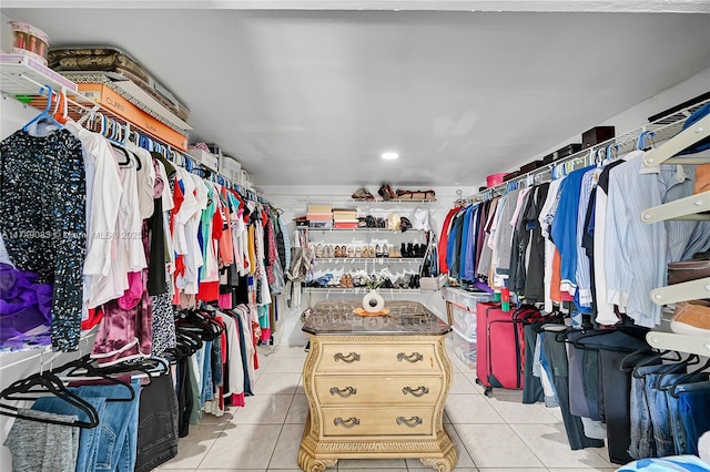 spacious closet with light tile patterned flooring