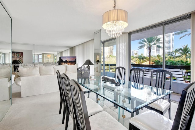 dining space featuring a chandelier