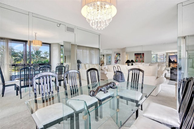 carpeted dining space featuring floor to ceiling windows, visible vents, and an inviting chandelier