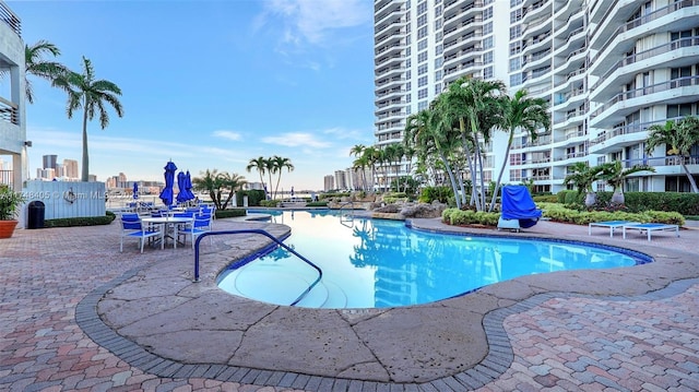 pool with a patio