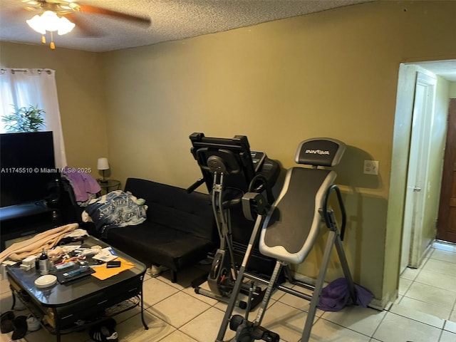 120 NE 75th St, Miami, FL 33138 - workout room featuring light tile patterned floors, ceiling fan, and a textured ceiling