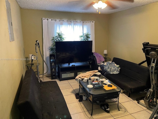 120 NE 75th St, Miami, FL 33138 - living room featuring light tile patterned floors, electric panel, a ceiling fan, and a textured ceiling