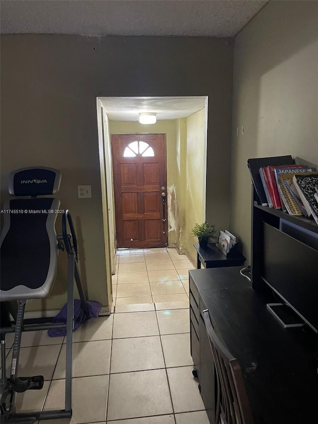 120 NE 75th St, Miami, FL 33138 - foyer featuring light tile patterned floors and a textured ceiling
