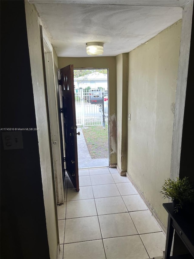 120 NE 75th St, Miami, FL 33138 - doorway with light tile patterned floors