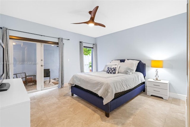 bedroom with access to exterior, ceiling fan, and baseboards