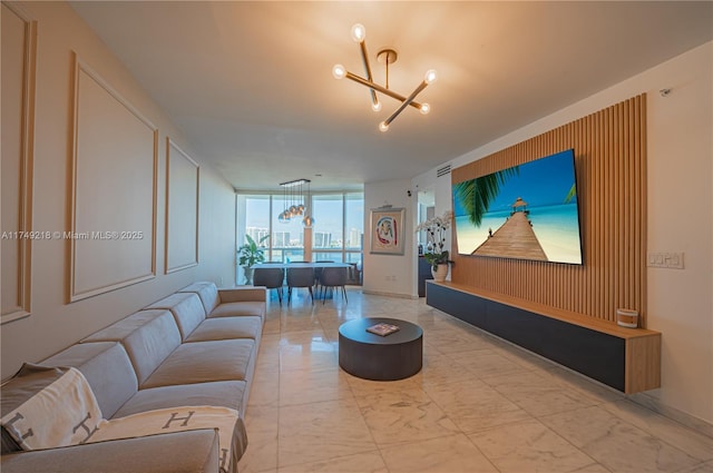 18201 Collins Ave Unit 1201, Sunny Isles Beach, FL 33160 - living room featuring a chandelier, floor to ceiling windows, and light marble finish floors