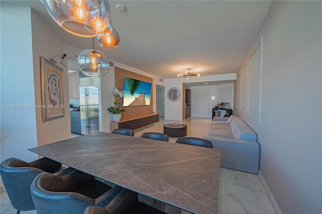 18201 Collins Ave Unit 1201, Sunny Isles Beach, FL 33160 - dining room with marble finish floors and baseboards