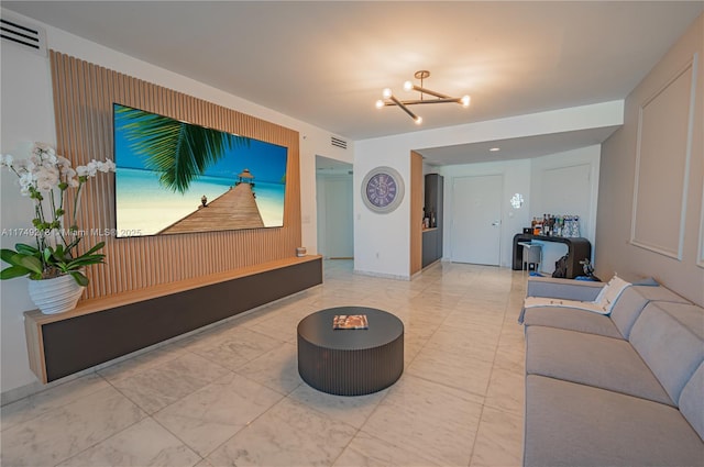 18201 Collins Ave Unit 1201, Sunny Isles Beach, FL 33160 - living area with a chandelier and marble look tile flooring