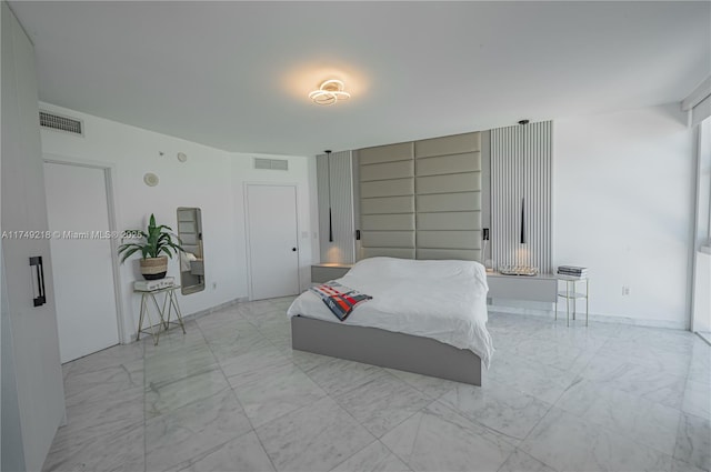 18201 Collins Ave Unit 1201, Sunny Isles Beach, FL 33160 - bedroom featuring light marble finish flooring
