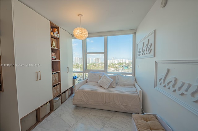 18201 Collins Ave Unit 1201, Sunny Isles Beach, FL 33160 - bedroom with a city view, light marble finish floors, and floor to ceiling windows