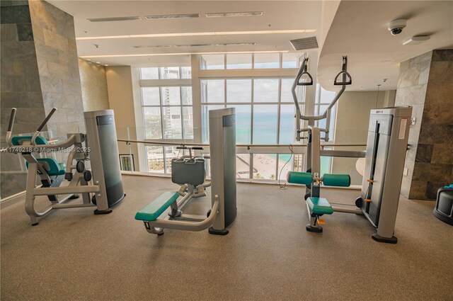 18201 Collins Ave Unit 1201, Sunny Isles Beach, FL 33160 - exercise room with a wall of windows