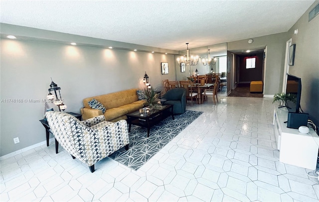 3800 Oaks Clubhouse Dr Unit 112, Pompano Beach, FL 33069 - living room with a textured ceiling, a chandelier, tile patterned flooring, and baseboards