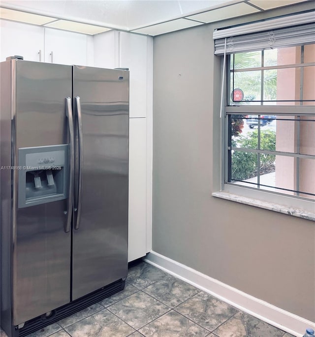 3800 Oaks Clubhouse Dr Unit 112, Pompano Beach, FL 33069 - kitchen with stainless steel fridge and baseboards